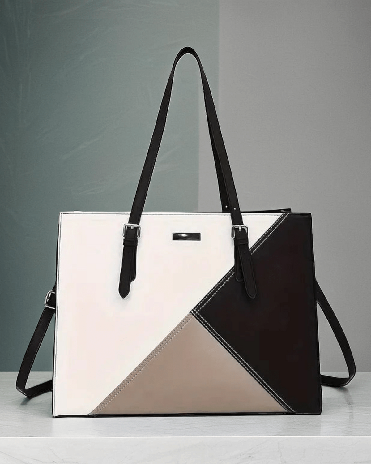 MONOCHROME TRIANGLE HANBAG