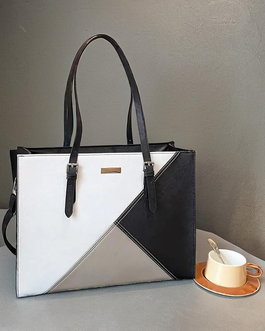 MONOCHROME TRIANGLE HANBAG