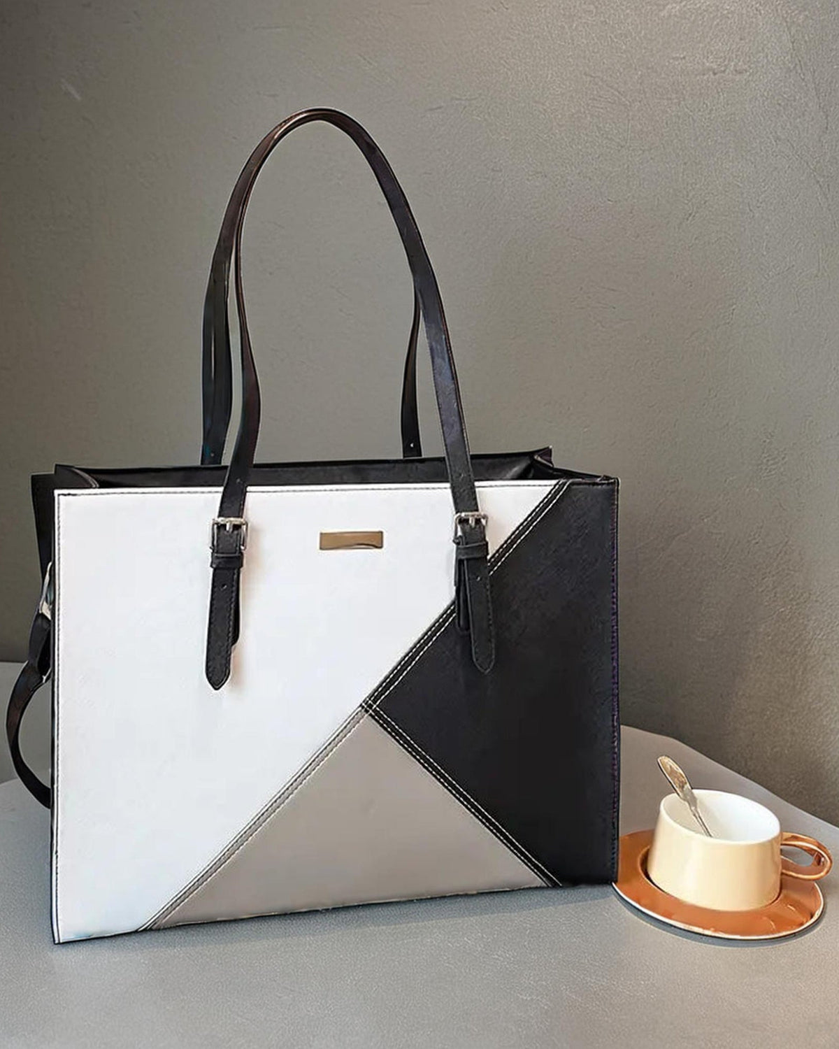 MONOCHROME TRIANGLE HANBAG