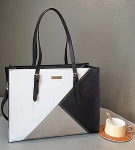 MONOCHROME TRIANGLE HANBAG